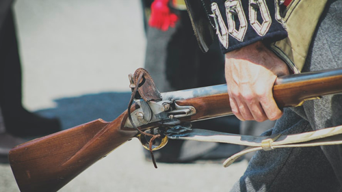 person holding gun